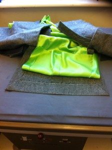 Bespoke mens jacket showing the lining and hem inlay before basting the lining in place.