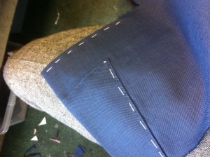 Gauntlet cuff hand stitched edges.